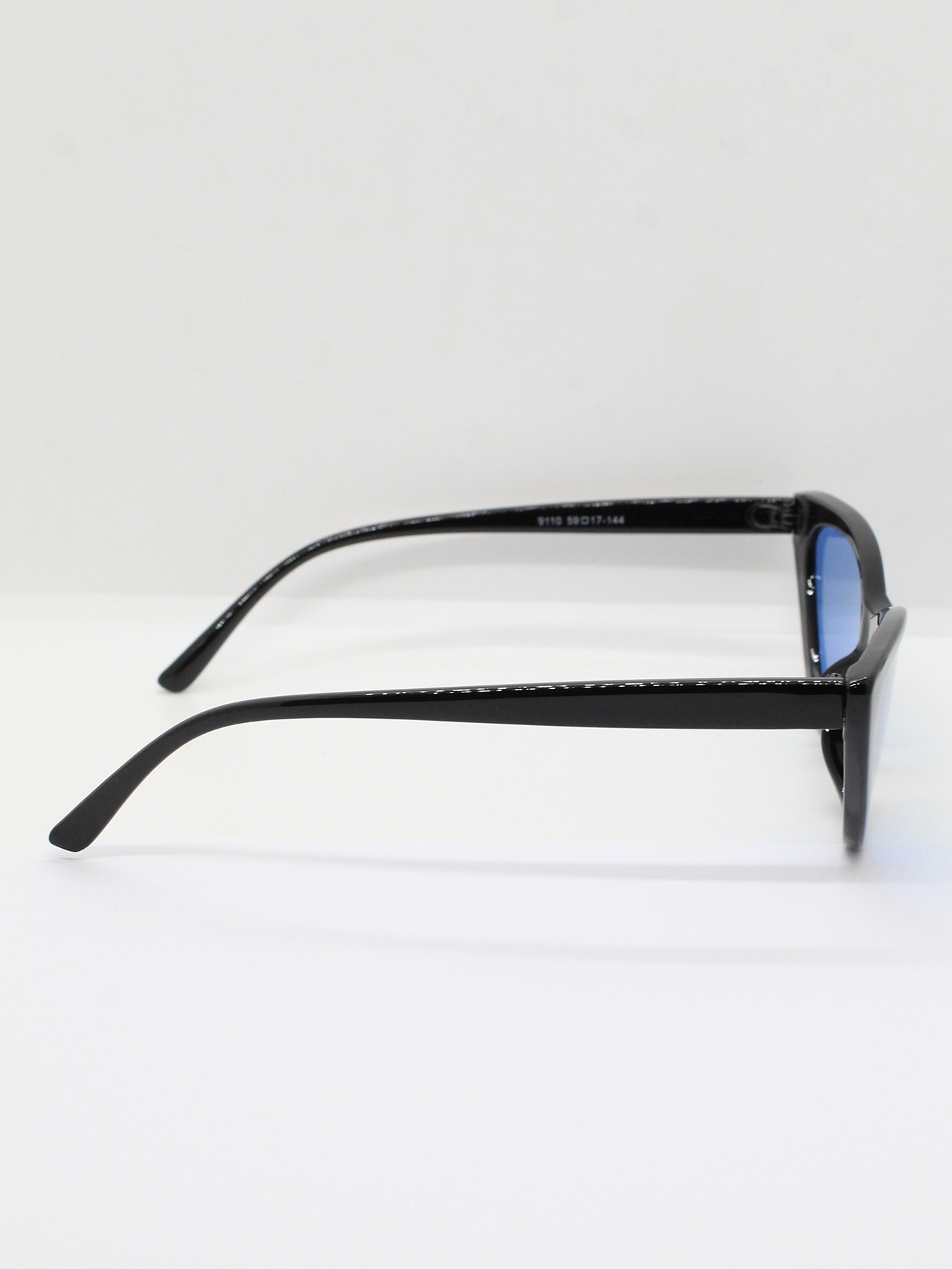 Lente de Sol Color Negro Azul